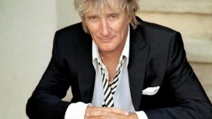 Ironia și Politica: Rod Stewart și Reacțiile la Glumele Regelui Charles în Contextul American